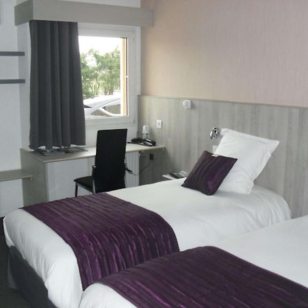 Brit Hotel Dak Hotel Avallon Bagian luar foto