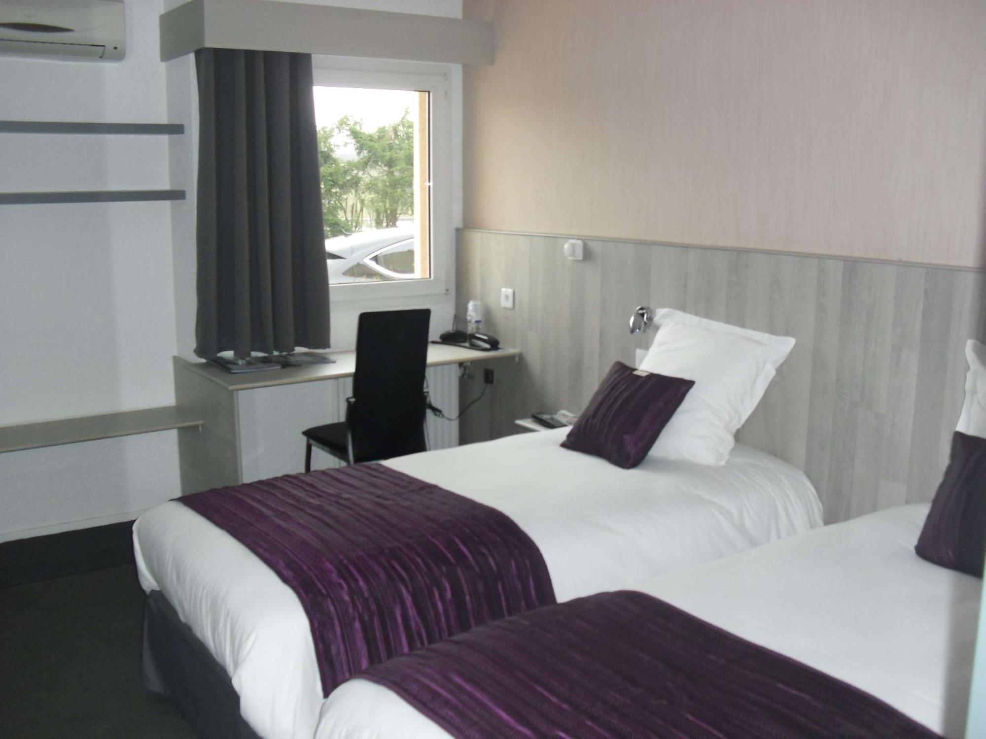 Brit Hotel Dak Hotel Avallon Bagian luar foto