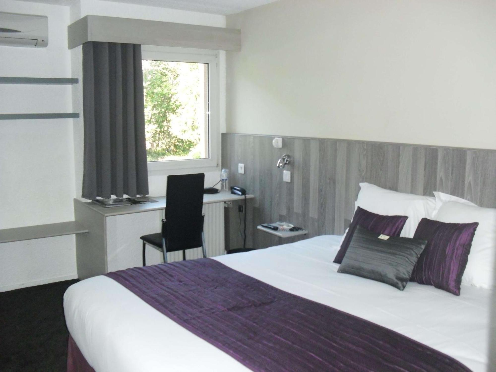 Brit Hotel Dak Hotel Avallon Bagian luar foto